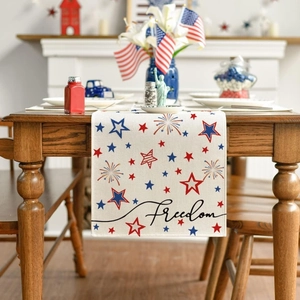 Linen table runner with red and blue star patterns and Freedom text for July 4th