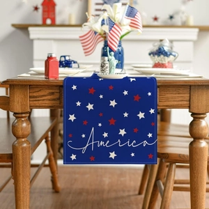 Close-up of linen America table runner with stars and stripes for Independence Day decor