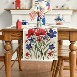 Close-up of linen table runner with red and blue floral print for Independence Day