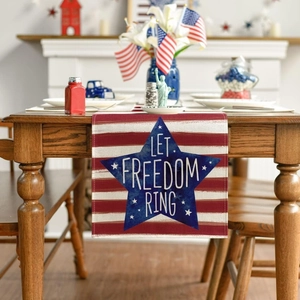 Detail of Let Freedom Ring linen table runner with red white stripes and blue star