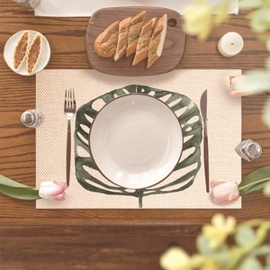 Minimalist monstera leaf heat resistant placemat in beige cotton linen blend fabric