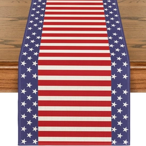 Linen table runner with American flag stars and stripes on dark wooden table