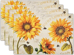 Detail view of four-piece sunflower and honeybee placemats with vintage linen texture