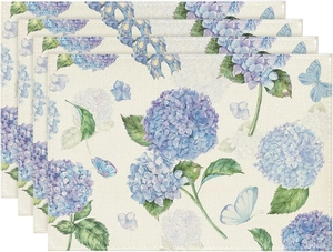 Detail of fabric texture on placemats with hydrangea flower and butterfly prints