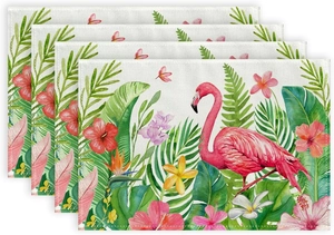 Set of four tropical placemats featuring pink flamingo and hibiscus flower patterns