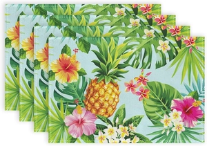 Detail of 4-piece rectangular tropical placemats with pineapple and palm leaf patterns