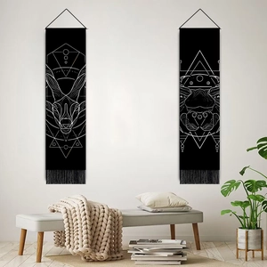 Minimalist black and white zodiac wall tapestries with geometric animal prints and tassels