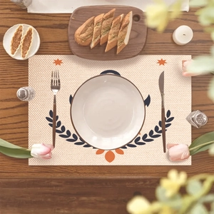 Cartoon sailboat anchor placemat with nautical elements on a wooden dining table