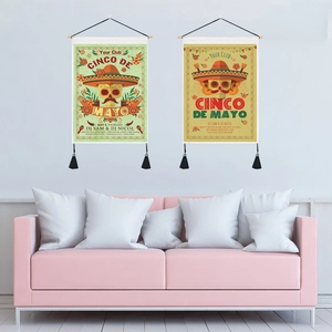 Cinco de Mayo tapestry set with skull patterns and black tassels in a cozy home setting