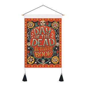 Detailed view of Day of the Dead tapestry with tassels and skull patterns