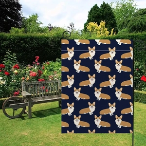 Double-sided linen garden flag with Corgi dog pattern on metal stand in a lush yard