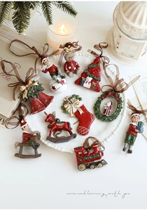 Assorted vintage resin Christmas tree ornaments with colorful hand-painted details