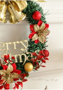 Détail d'une couronne de Noël de 30 cm avec cloches dorées et inscription Joyeux Noël