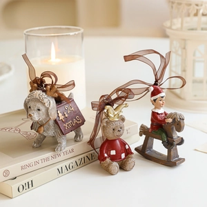 Retro resin Christmas ornaments set with puppy, bear and elf on vintage book background