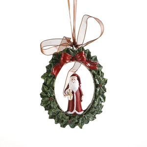 Resin painted Christmas tree ornament featuring Santa with a lantern and red bow