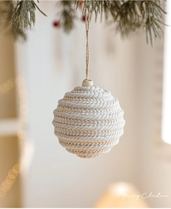 Close-up of 8cm cream cotton rope woven Christmas ball ornament with natural wood bead