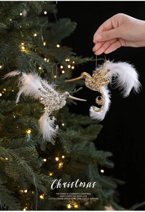 Glittery hummingbird Christmas tree ornaments with white feathers in gold and silver