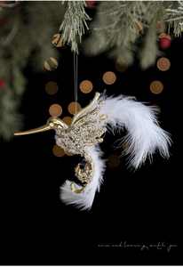 Glittering golden hummingbird ornament with sparkling crystals and soft white feathers