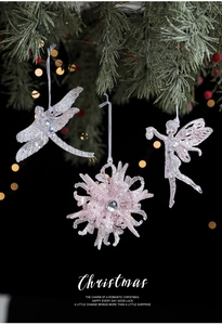 Sparkling pink glitter Christmas ornaments featuring dragonfly, snowflake, and fairy shapes