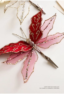 Detail of red and pink mesh butterfly clip with glitter and sequins for decor