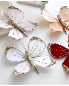 Detail of beaded velvet butterfly clips with glitter edges for Christmas tree decoration