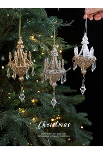 Detailed macro of gold and silver chandelier-shaped ornaments with glittering crystal beads