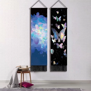 Vertical butterfly wall tapestries with tassels hanging on a white brick wall for home decor