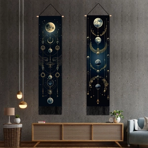 Detailed view of solar system moon phase tapestries with gold sun and black fringes