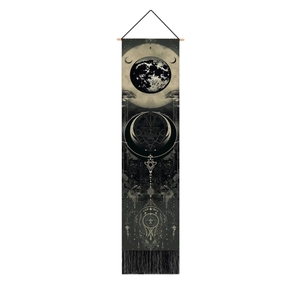 Detailed texture of planet hanging tapestry with astrology pattern and black fringe tassels