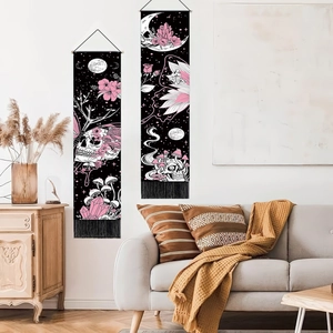 Gothic skull and floral wall tapestries with tassels in a cozy home decor setting