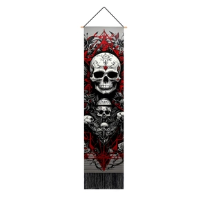 Macro shot of gothic skull tapestry with red geometry, wood rod and black tassels