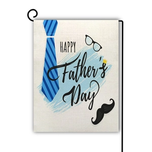 Detail of linen Father's Day garden flag with tie and beard graphics on a metal stand