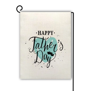 Detail of linen garden flag for Father's Day with happy lettering and teal heart