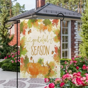 Grateful Season garden flag with pumpkin and maple leaf design on outdoor metal stand