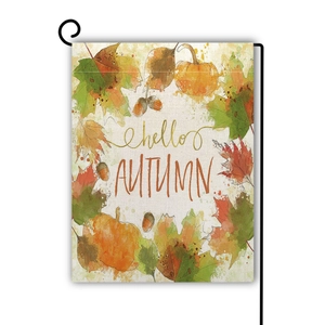 Detailed close-up of autumn linen garden flag with hello AUTUMN print and metal stand