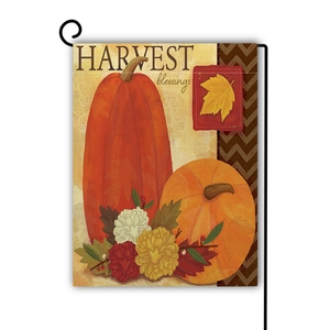 Detail of harvest blessings garden flag featuring pumpkins and fall floral textures