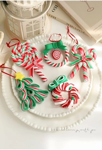 Set of five red white and green Christmas candy ornaments including lollipops and trees