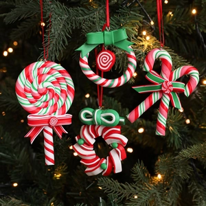 Christmas tree hanging ornaments with red, white, and green clay candy cane and lollipop designs
