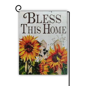 Detail of Bless This Home garden flag with sunflower print and metal hanging hook