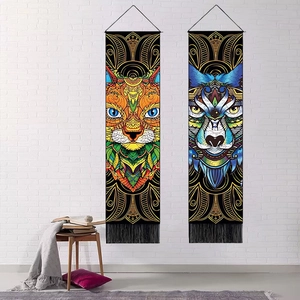 Bohemian style animal tapestry with fox and cat illustrations and black tassels