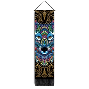 Detail of bohemian wolf tapestry with wooden rod, black tassels and geometric canvas art