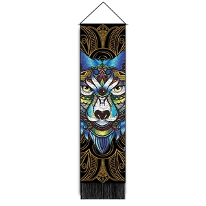 Detail of bohemian tapestry featuring a colorful geometric wolf head with black tassels