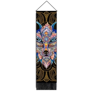 Vertical bohemian wall tapestry featuring a colorful wolf head design with black fringe