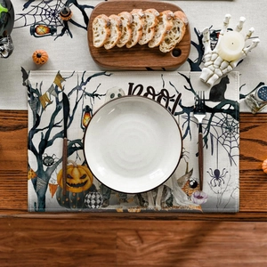 Halloween placemat featuring hand-drawn ghost and pumpkin patterns with artistic BOO text