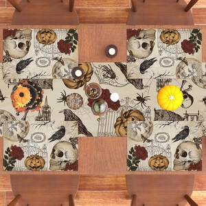Gothic Halloween table runner and placemats set with skulls, pumpkins and crows