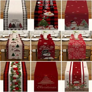 Nine diverse Christmas linen table runners featuring Santa Claus and reindeer designs