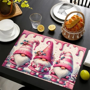 Pink Christmas gnome placemat on dark wooden table with warm festive brunch setting