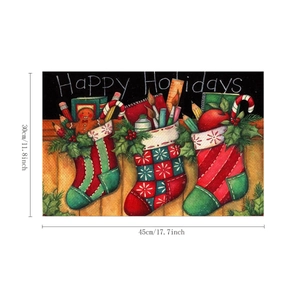 Detail of 30x45cm Christmas linen placemat featuring retro stockings and Happy Holidays text