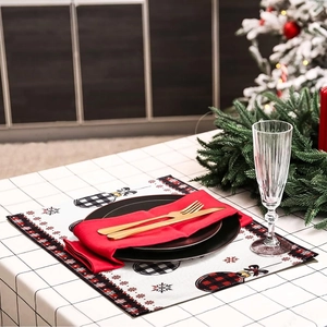 Christmas place mat with buffalo plaid bulb print on festive table setting