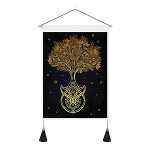 Detail of tree of life tapestry with celtic knots, gold embroidery and black tassels